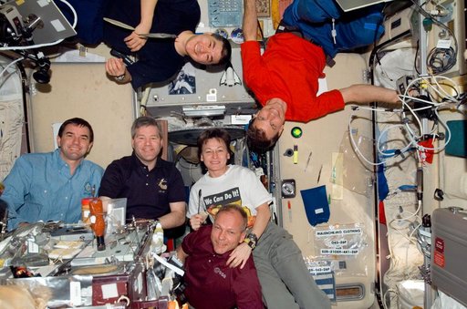 Crewmembers share a meal in SM