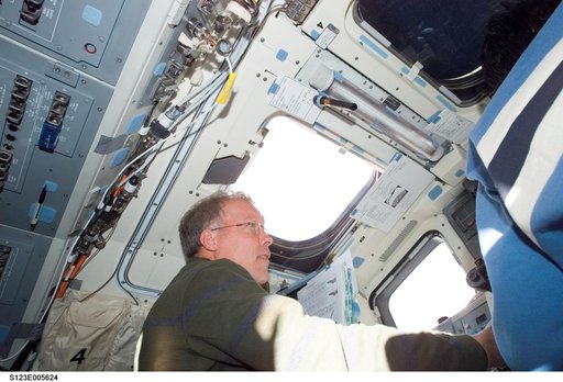 Gorie at the aft FD window during STS-123 mission