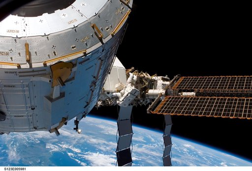 Reisman works near S4 Truss on first EVA during Joint Operations