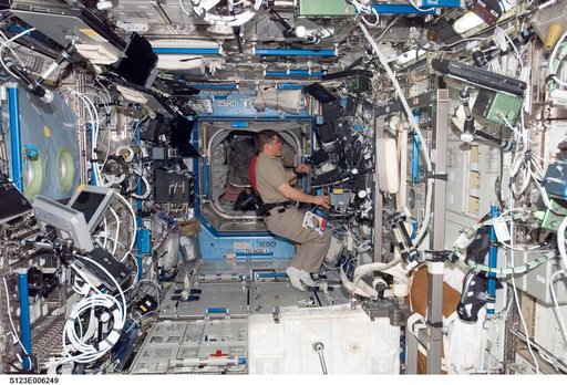 STS-123 Crewmembers work at Robotic Controls during STS-123 / Expedition 16 Joint Operations