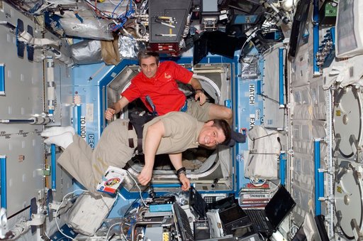 STS-123 Crewmembers work at Robotic Controls during STS-123 / Expedition 16 Joint Operations