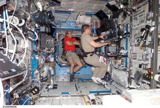 STS-123 Crewmembers work at Robotic Controls during STS-123 / Expedition 16 Joint Operations