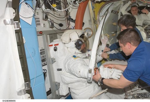 Foreman and Linnehan after EVA 2 in the A/L during Joint Operations