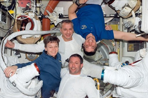 Expedition 16 and STS-123 crewmembers after EVA 2 in the A/L during Joint Operations