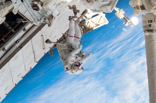 Linnehan and Foreman on EVA 2 - during Expedition 16 / STS-123 Joint Operations