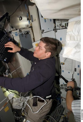 Behnken works on computer in the FWD MDDK during Joint Operations