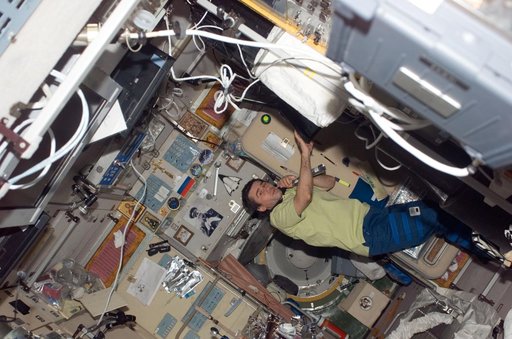 Malenchenko works in the SM during Joint Operations