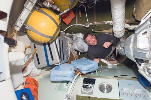 Foreman moves through Pirs DC 1 hatch during Joint Operations
