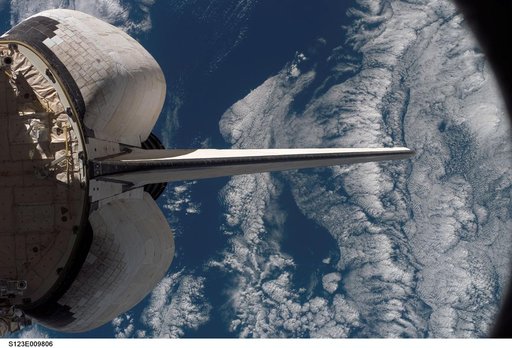 Shuttle Endeavour returns home after the STS-123 Mission