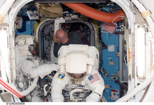 Garan and Fossum in airlock prior to EVA 1