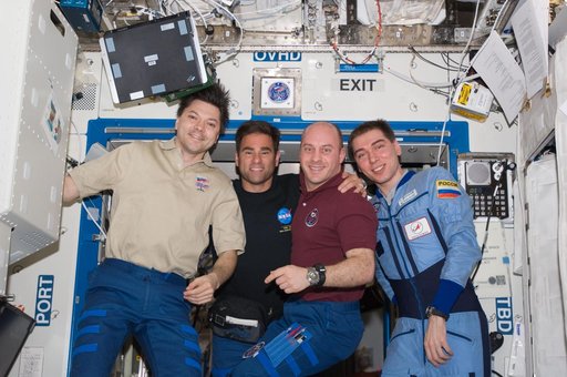 Expedition 17 and STS-124 crew pose for on-orbit portrait