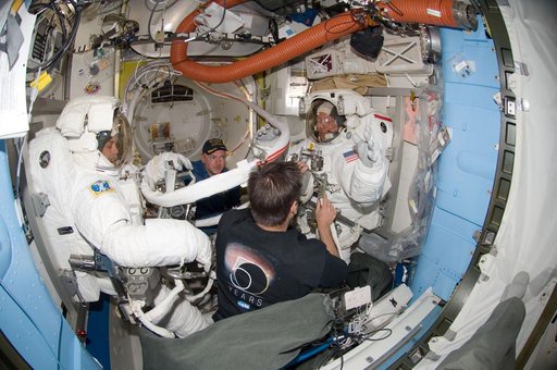 Preparing for EVA 3 in Quest airlock