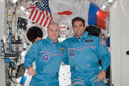 Reisman and Chamitoff on-orbit portrait