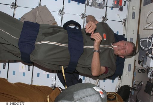 Fossum in sleeping bag on middeck