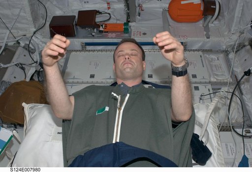 Garan in sleeping bag in Columbus module