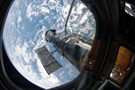 Hubble Space Telescope (HST) during rendezvous with STS-125 Shuttle Atlantis