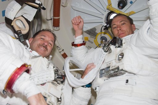 STS-125 Feustel and Grunsfeld in the Airlock after EVA1