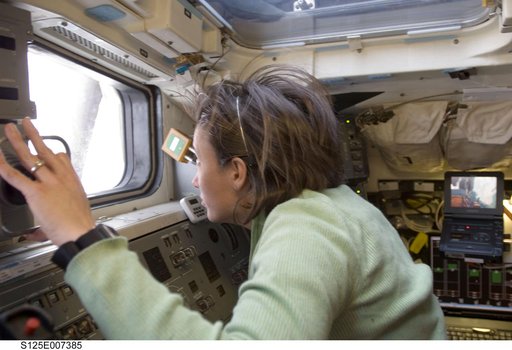 STS-125 MS2 McArthur works on the Flight Deck during EVA1