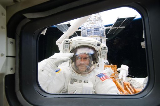 STS-125 MS1 Good posing for a photo during EVA2