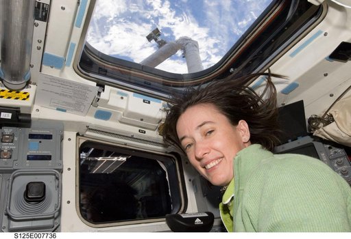 STS-125 MS2 McArthur poses for a photo on the FD during Flight Day 5