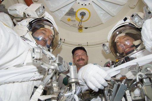 STS-125 Crew Members pose for a photo in the Airlock prior to EVA3