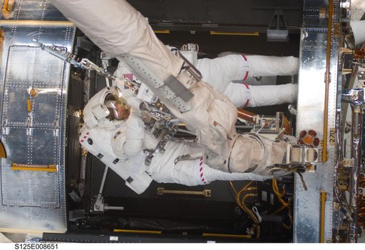 STS-125 MS1 Good and MS4 Massimino during EVA4