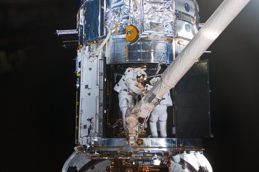 STS-125 MS1 Good and MS4 Massimino during EVA4