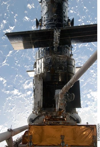 STS-125 MS1 Good and MS4 Massimino during EVA4