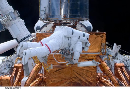 STS-125 MS3 Grunsfeld during EVA5