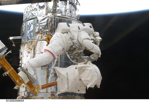 STS-125 MS3 Grunsfeld during EVA5
