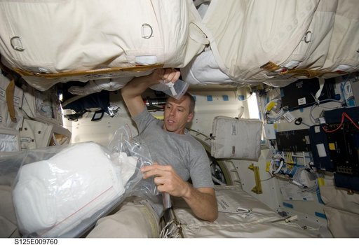 View of STS-125 MS5 Feustel on the Shuttle Atlantis Middeck