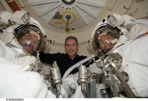 STS-125 Crew Members pose for a photo prior to EVA5