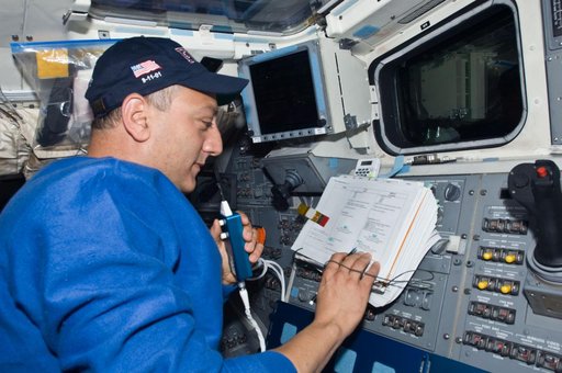 STS-125 MS4 Massimino works on the Flight Deck during Flight Day 8