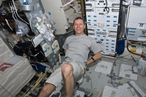 STS-125 Pilot Gregory Johnson exercises in the MDDK