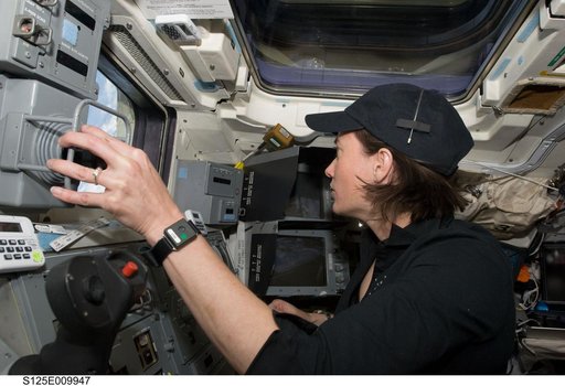 STS-125 MS2 McArthur works the SRMS during Flight Day 8
