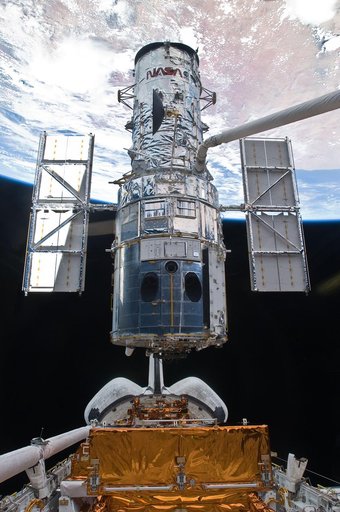 View of HST during its release from the Shuttle Atlantis