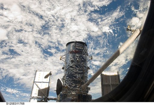 View of HST during its release from the Shuttle Atlantis