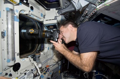 STS-125 MS3 Grunsfeld photographs the HST after being released from the Shuttle Atlantis