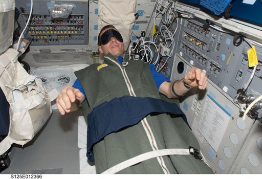STS-125 Pilot Gregory C. Johnson on the Flight Deck