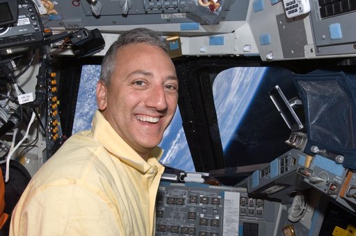 STS-125 MS Mike Massimino poses for a photo on the Flight Deck