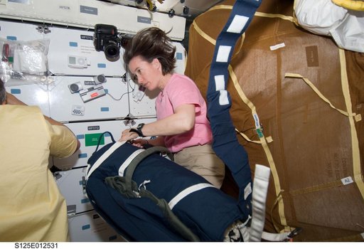 View of STS-125 MS Megan McArthur in the Middeck