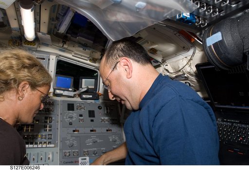 Payette and Polansky work in the aft FD on Space Shuttle Endeavour during the STS-127 Mission