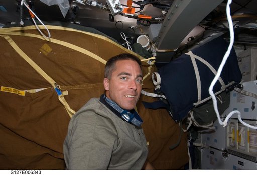Cassidy in the MDDK on the Space Shuttle Endeavour during the STS-127 Mission