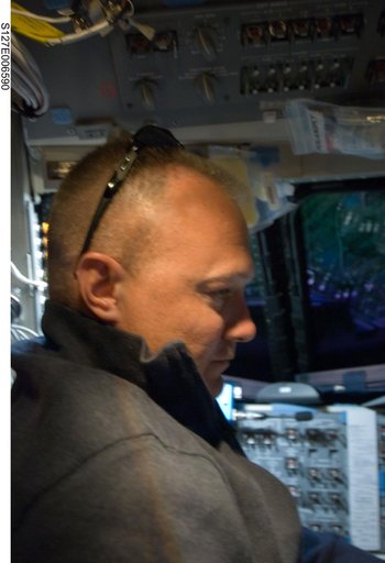 Hurley in the FWD FD during docking activities of Space Shuttle Endeavour