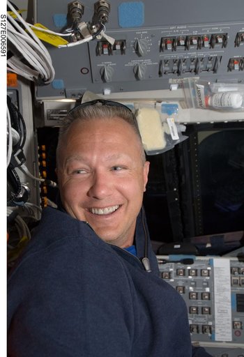 Hurley in the FWD FD during docking activities of Space Shuttle Endeavour