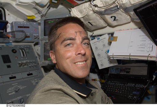 Cassidy in the aft FD during docking activities of Space Shuttle Endeavour