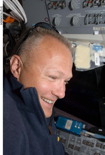 Hurley in the FWD FD during docking activities of Space Shuttle Endeavour