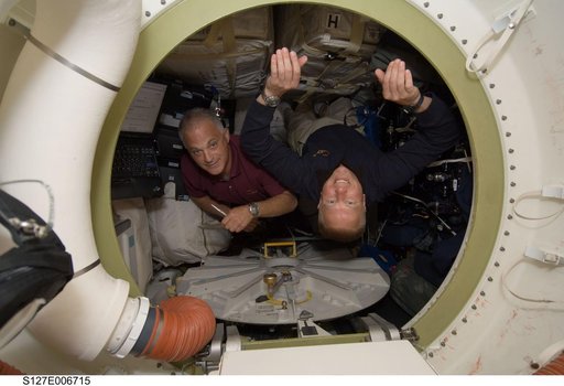 Kopra and Wolf in the A/L during STS-127 Mission