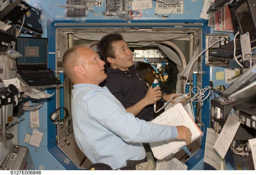 Wakata and Hurley during EVA-1 of STS-127 / Expedition Joint Operations