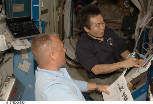 Wakata and Hurley during EVA-1 of STS-127 / Expedition Joint Operations